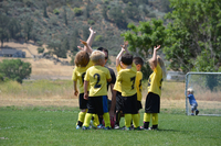 canva-kids-in-the-soccer-field.jpg